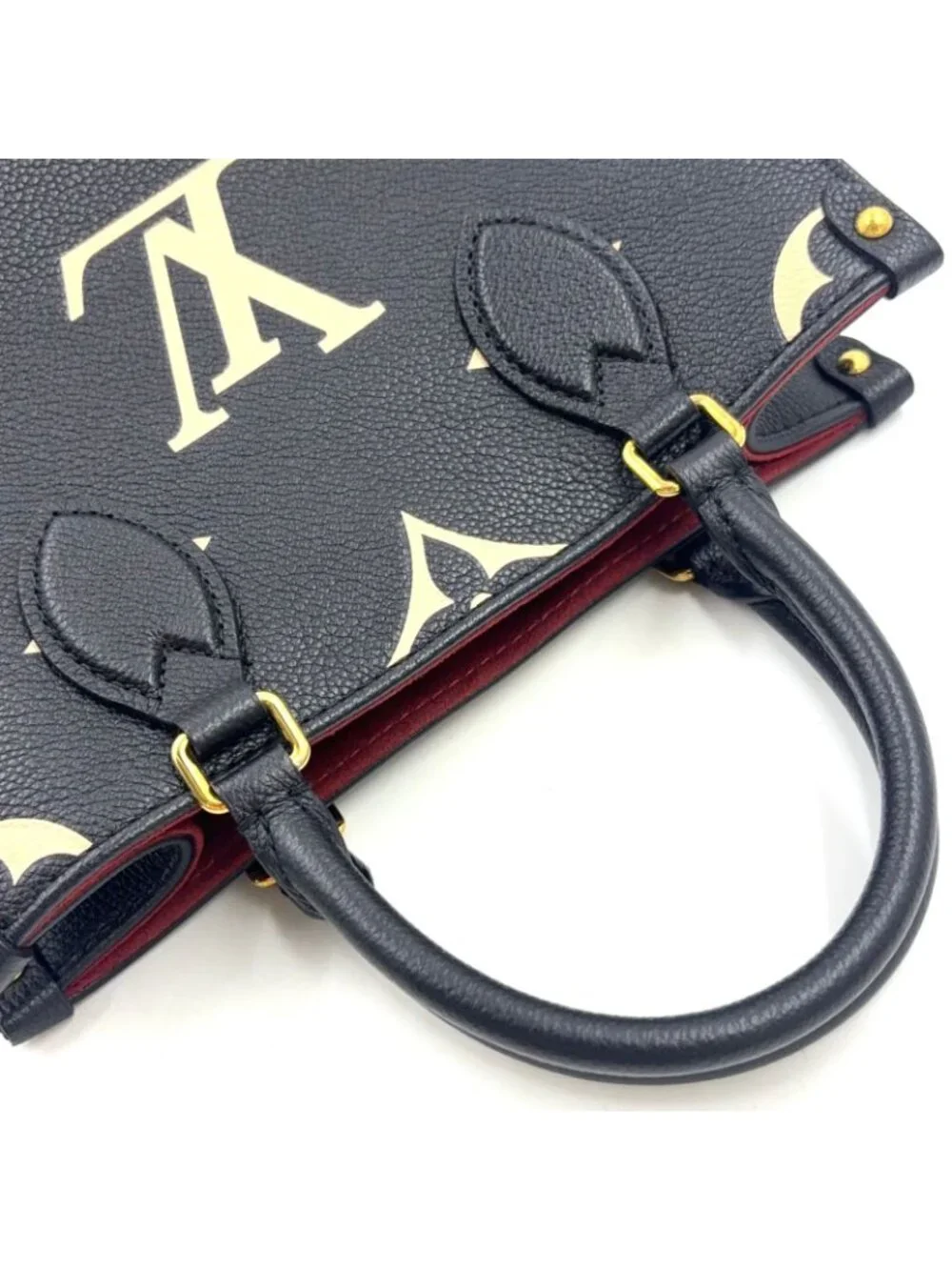 Louis Vuitton On The Go PM Bicolor Monogram Empreinte Leather Black Handbag Gold